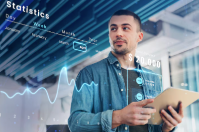 Fintech Man using the iPad and financial stastics datas